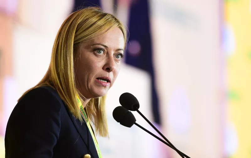 Leader of Italian far-right party "Fratelli d'Italia" (Brothers of Italy), Giorgia Meloni delivers a speech on October 1, 2022 during a visit to the "Villagio Coldiretti" in Milan, a three-day event organized by the Italian Italian Farmers' Association. (Photo by Piero CRUCIATTI / AFP)