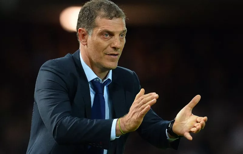 West Ham United's Croatian manager Slaven Bilic gestures to his players during the English Premier League football match between West Ham United and Newcastle United at The Boleyn Ground in Upton Park, East London on September 14, 2015.   AFP PHOTO / GLYN KIRK


RESTRICTED TO EDITORIAL USE. NO USE WITH UNAUTHORIZED AUDIO, VIDEO, DATA, FIXTURE LISTS, CLUB/LEAGUE LOGOS OR 'LIVE' SERVICES. ONLINE IN-MATCH USE LIMITED TO 75 IMAGES, NO VIDEO EMULATION. NO USE IN BETTING, GAMES OR SINGLE CLUB/LEAGUE/PLAYER PUBLICATIONS.