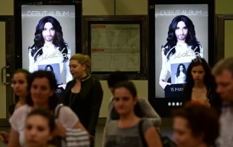 2628223 05/19/2015 Posters with the Eurovision 2014 winner, Conchita Wurst, at the metro before first semi-final of the Eurovision 2015 song contest in Vienna. Maksim Blinov/RIA Novosti