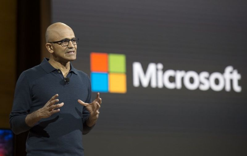 Microsoft chief executive officer Satya Nadella talks at a Microsoft news conference October 26, 2016 in New York. / AFP PHOTO / DON EMMERT