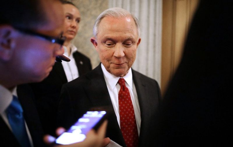 WASHINGTON, DC - FEBRUARY 08: Sen. Jeff Sessions (R-AL) (C) talks with reporters after Senate confirmed him as the next U.S. Attorney General at the U.S. Capitol February 8, 2017 in Washington, DC. The first U.S. senator to endorse Donald Trump during his presidential campaign, Sessions was confirmed by a 52-47 vote to become the nation's top law enforcement official after two decades as a Republican senator from Alabama.   Chip Somodevilla/Getty Images/AFP