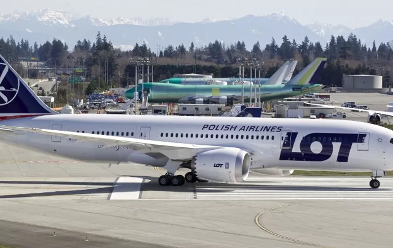 EVERETT, WASHINGTON - MARCH 25: A LOT Polish Airlines Boeing 787 Dreamliner, with a redesigned lithium ion battery, taxis from the flight line to the runway before a test flight March 25, 2012 at Paine Field in Everett, Washington. The 787 has been grounded since January after problems with the lithium ion battery.   Stephen Brashear/Getty Images/AFP
