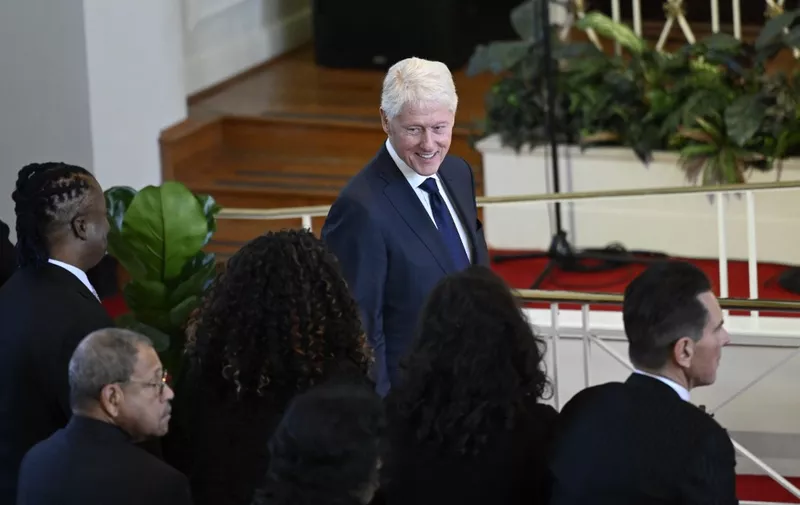 Former US President Bill Clinton arrives prior to a tribute service for former US First Lady Rosalynn Carter, at Glenn Memorial Church in Atlanta, Georgia, on November 28, 2023. Carter died on November 19, aged 96, just two days after joining her husband in hospice care at their house in Plains. (Photo by ANDREW CABALLERO-REYNOLDS / AFP)