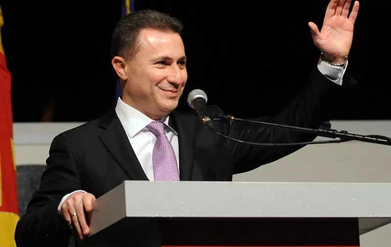 Party leader and Macedonian Prime Minister Nikola Gruevski celebrates the ruling conservative VMRO-DPMNE coalition's election victory in Skopje, early on April 28, 2014, after winning the parliamentary elections. Macedonia's conservative ruling party has secured a third term in office, winning both parliamentary and presidential elections on Sunday, based on preliminary results of the ballot that the opposition said it would not recognise. AFP PHOTO / ROBERT ATANASOVSKI