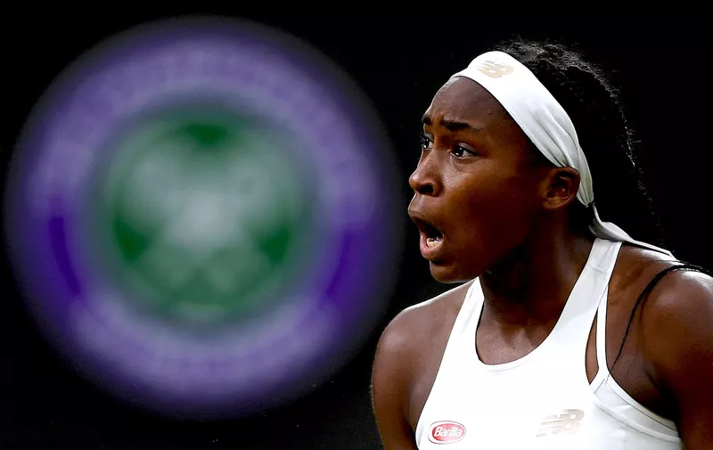 LONDON, ENGLAND - JULY 03: Cori Gauff of the United States celebrates match point in her Ladies' Singles second round match against Magdalena Rybarikova of Slovakia during Day three of The Championships - Wimbledon 2019 at All England Lawn Tennis and Croquet Club on July 03, 2019 in London, England. (Photo by Shaun Botterill/Getty Images)