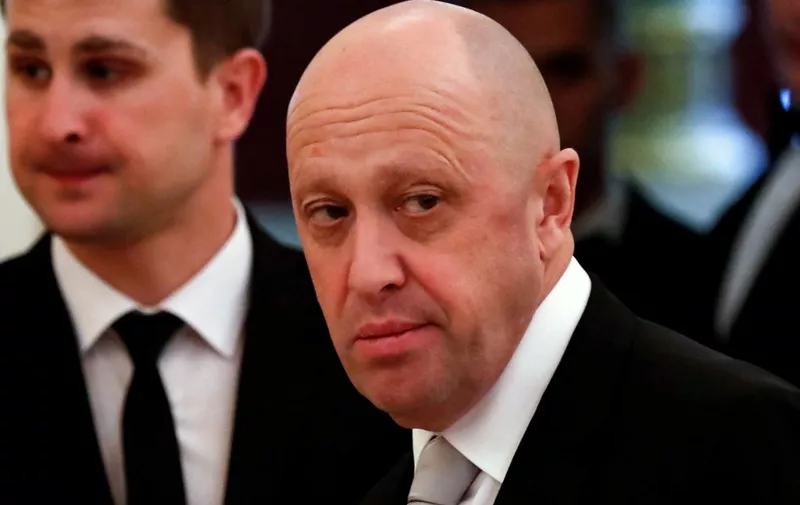 (FILES) This file photo taken on July 04, 2017 shows Russian businessman Yevgeny Prigozhin prior to a meeting with business leaders held by Russian and Chinese presidents at the Kremlin in Moscow. - The head of the Wagner mercenary outfit, Yevgeny Prigozhin, on February 22, 2023 urged Russians to pressure the country's regular army into sharing ammunition with his fighters in Ukraine. Prigozhin, who the day earlier made headlines when he accused Russia's top brass of essentially committing "treason", stopped short of calling on Russians to protest but urged everyone from "driver" to "flight attendant" to help him. (Photo by Sergei ILNITSKY / POOL / AFP)