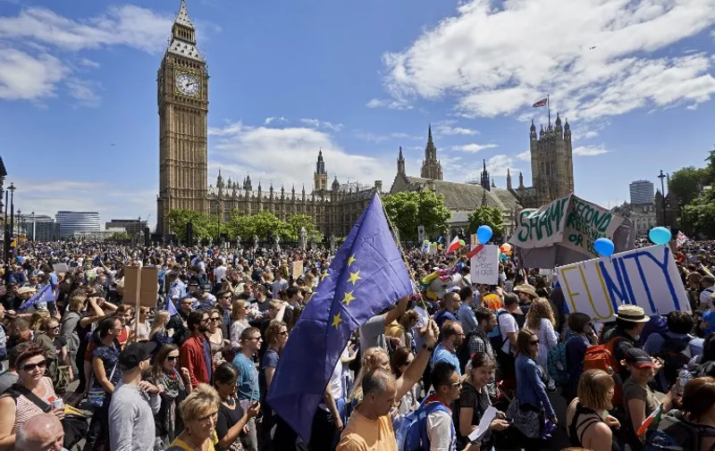 Thousands of protesters gather in Parliament Square as they take part in a March for Europe, through the centre of London on July 2, 2016, to protest against Britain's vote to leave the EU, which has plunged the government into political turmoil and left the country deeply polarised.
Protesters from a variety of movements march from Park Lane to Parliament Square to show solidarity with those looking to create a more positive, inclusive kinder Britain in Europe. / AFP PHOTO / Niklas HALLE'N