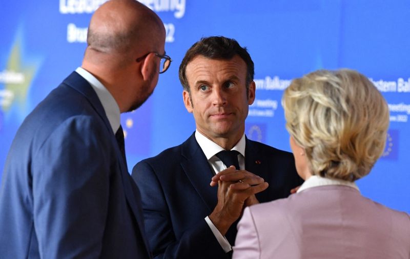 From left: President of the European Council Charles Michel, France's President Emmanuel Macron and President of the European Commission Ursula von der Leyen speak prior to the start of the EU-Western Balkans leaders' meeting in Brussels on June 23, 2022. - The European Union, which at a summit on June 23 and 24, 2022, will discuss whether to make Ukraine a membership candidate, has admitted over 15 countries in the past three decades. (Photo by JOHN THYS / POOL / AFP)