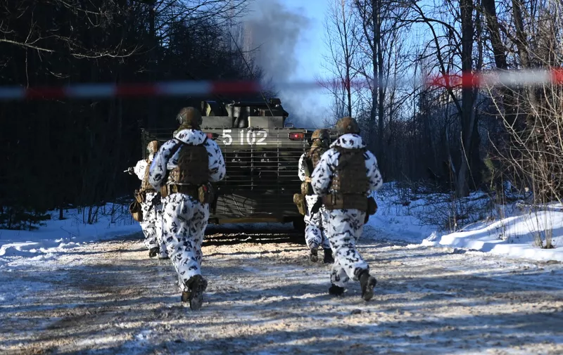 Ukrainian National Guard soldiers conduct a simulated patrol with a BTR-80 armored personnel carrier during an urban warfare exercise held in the village of Pripyat near the Belarussian border by the Ukrainian Ministry of Internal Affairs, as Russian forces continue to mobilize on the country's borders on February 4, 2022 in Pripyat, Ukraine.,Image: 659542275, License: Rights-managed, Restrictions: *** World Rights ***, Model Release: no, Credit line: Profimedia