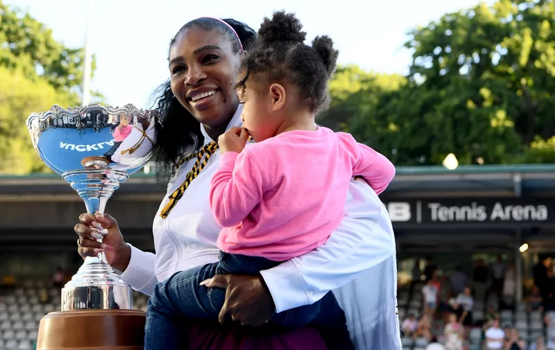 AUCKLAND, NEW ZEALAND - JANUARY 12:  Serena Williams of the USA celebrates with daughter Alexis Olympia after winning the final match against Jessica Pegula of USA at ASB Tennis Centre on January 12, 2020 in Auckland, New Zealand. (Photo by Hannah Peters/Getty Images)