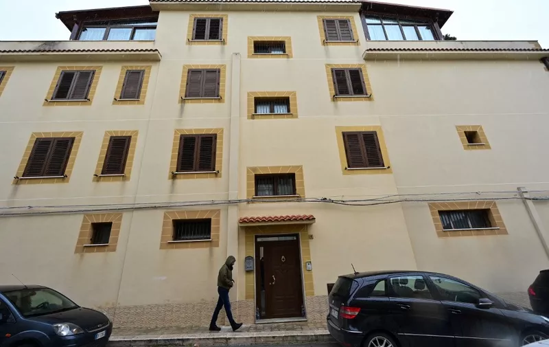 (FILES) The family house of arrested mafia boss Matteo Messina Denaro is pictured on January 20, 2023 in Castelvetrano after Sicilian godfather Matteo Messina Denaro, was arrested on January 16, 2023 in Palermo after 30 years on the run. Notorious Sicilian Mafia boss Matteo Messina Denaro, captured in January is in a coma in hospital and no longer being fed, reports said on September 23, 2023. The 61-year-old has been suffering from colon cancer for several years, and it was his decision to seek treatment that led to his arrest following a visit to a clinic in the Sicilian capital Palermo. (Photo by MIGUEL MEDINA / AFP)