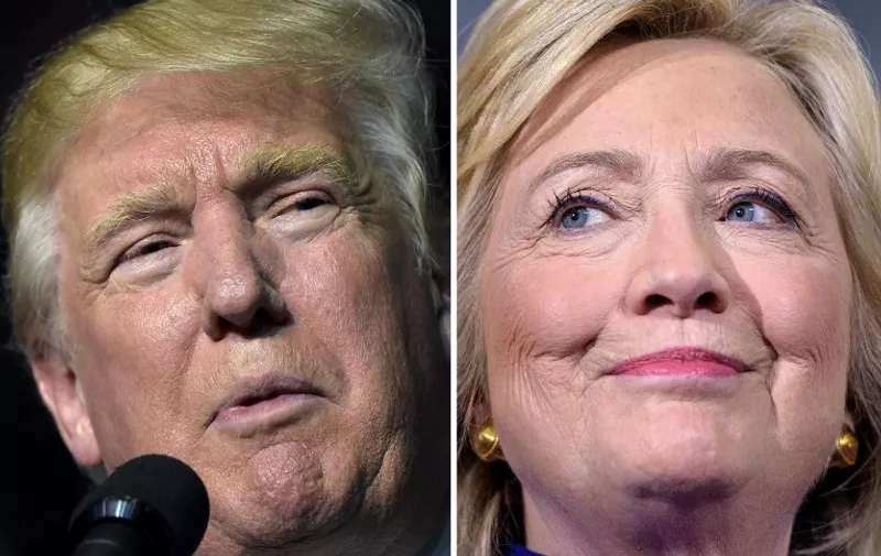 (FILES) This file photo taken on September 25, 2016 shows a combination of images showing Republican presidential nominee Donald Trump in Roanoke, Virginia on September 24, 2016 and Democratic presidential nominee Hillary Clinton September 21, 2016 in Orlando, Florida.
Republican presidential nominee Donald Trump has edged ahead of Democratic rival Hillary Clinton by a point for the first time since May, an ABC News/Washington Post tracking poll out November 1, 2016 has found. The poll also registered a seven point decline for Clinton in the share of likely voters who are strongly enthusiastic about her, a possible reflection of the renewed controversy over her use of a private server while secretary of state, pollster Gary Langer said. Trump's 46-45 percent lead in the four-way race for the White House, while well within the margin of error, is the first time he has polled ahead of Clinton in the survey since May.
 / AFP PHOTO / DESK