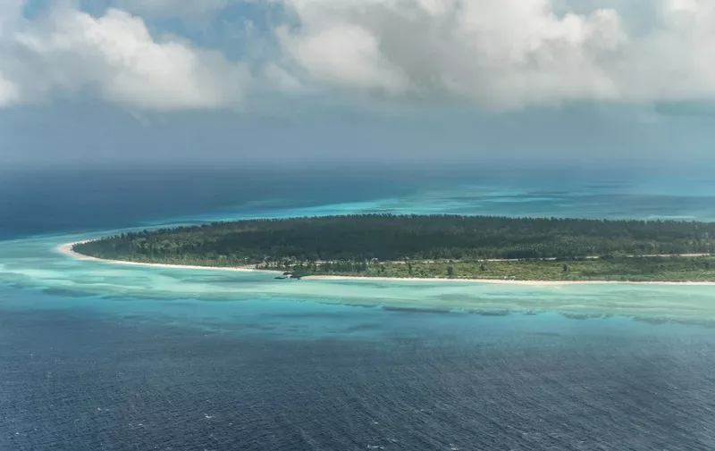 A view of the French island of la Grande Glorieuse, part of Les Glorieuses Islands in the Eparses archipelago, 250km northeast of the French Indian Ocean island of Mayotte, on October 23, 2019. - During his visit to meet scientists on the island, the French President Emmanuel Macron  announced that the island, whose French sovereignty is contested by Madagascar, will be classified as a natural reserve. (Photo by JACQUES WITT / POOL / AFP)