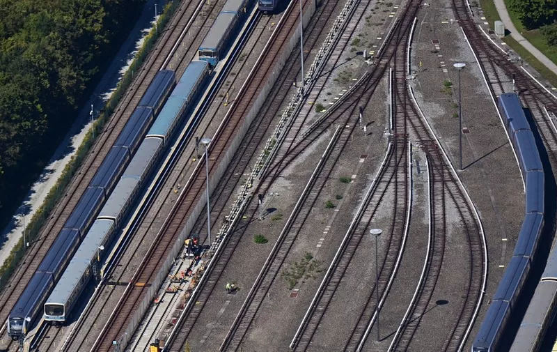 An aerial view shows railway tracks in Munich on September 5, 2021. (Photo by Tobias Schwarz / AFP)