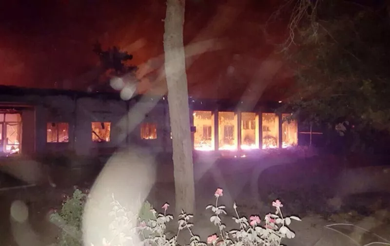 In this photograph released by Medecins Sans Frontieres (MSF) on October 3, 2015, fires burn in part of the MSF hospital in the Afghan city of Kunduz after it was hit by an air strike. An air strike on a hospital in the Afghan city of Kunduz on October 3 left three Doctors Without Borders staff dead and dozens more unaccounted for, the medical charity said, with NATO conceding US forces may have been behind the bombing. The MSF facility is seen as a key medical lifeline in the region and has been running "beyond capacity" during recent fighting that saw the Taliban seize control of the provincial capital for several days. AFP PHOTO / MSF ----EDITORS NOTE---- RESTRICTED TO EDITORIAL USE - MANDATORY CREDIT "AFP PHOTO/MSF" - NO MARKETING NO ADVERTISING CAMPAIGNS - DISTRIBUTED AS A SERVICE TO CLIENTS -----