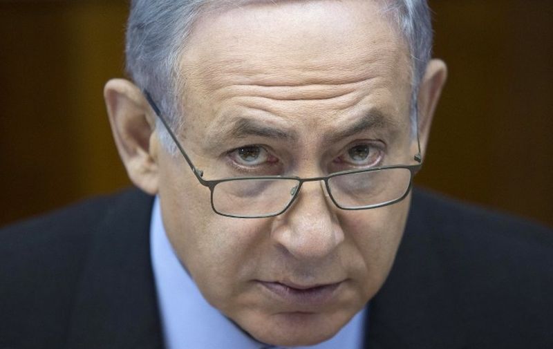 Israeli Prime Minister Benjamin Netanyahu attends the weekly cabinet meeting at his office in Jerusalem on August 16, 2015. AFP PHOTO / POOL / ABIR SULTAN