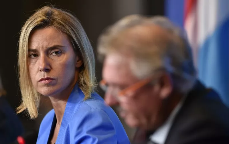 High Representative of the Union for Foreign Affairs and Security Policy and Vice-President of the Commission Federica Mogherini (L) gives a press conference with Luxembourg Foreign minister Jean Asselborn (R) on the second day of the EU Foreign Affairs Council meeting in Luxembourg, on September 5, 2015. AFP PHOTO/JOHN THYS