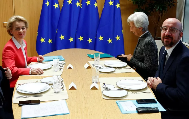 (From L) European Commission President Ursula von der Leyen, European Central Bank (ECB) President Christine Lagarde and European Council President Charles Michel, speak during a meeting in Brussels, on December 5, 2019. (Photo by FRANCOIS LENOIR / POOL / AFP)