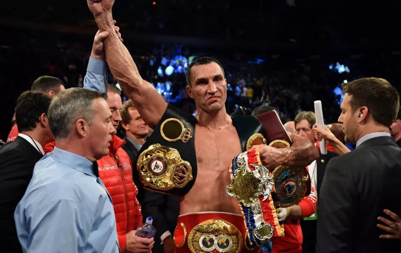 Wladimir Klitschko of the Ukraine celebrates his win over Bryant Jennings of the US after their World Heavyweight Championship boxing bout at Madison Square Garden in New York on April 25, 2015. AFP PHOTO / TIMOTHY A. CLARY