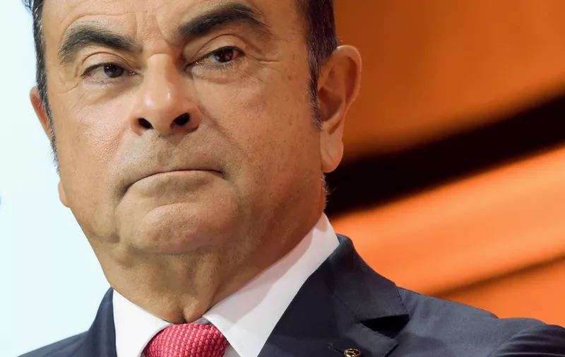 (FILES) In this file photo taken on September 15, 2017 then Renault-Nissan Chairman and CEO Carlos Ghosn looks on during a press conference in Paris to present the Renault Nissan group strategy. - France "will not extradite" Carlos Ghosn if the former Nissan boss, who fled Japan to avoid a trial and who has French citizenship, arrived in the country, junior economy minister Agnes Pannier-Runacher said on January 2, 2019. (Photo by ERIC PIERMONT / AFP)