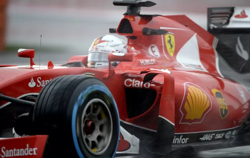 Ferrari's German driver Sebastian Vettel drives his car during the second practice session of the Russian Formula One Grand Prix at the Sochi Autodrom circuit on October 9, 2015. AFP PHOTO / ALEXANDER NEMENOV
