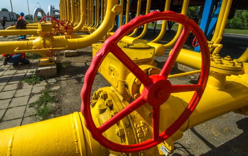 Gas pipes are photographed at the gas compressor station in Velke Kapusany, Slovakia, on September 2, 2014. Slovakia has opened a reverse gas pipeline that will get to Ukraine up to 10 billion cubic meters (353 billion cubic feet) of natural gas per year.    AFP PHOTO/JOE KLAMAR