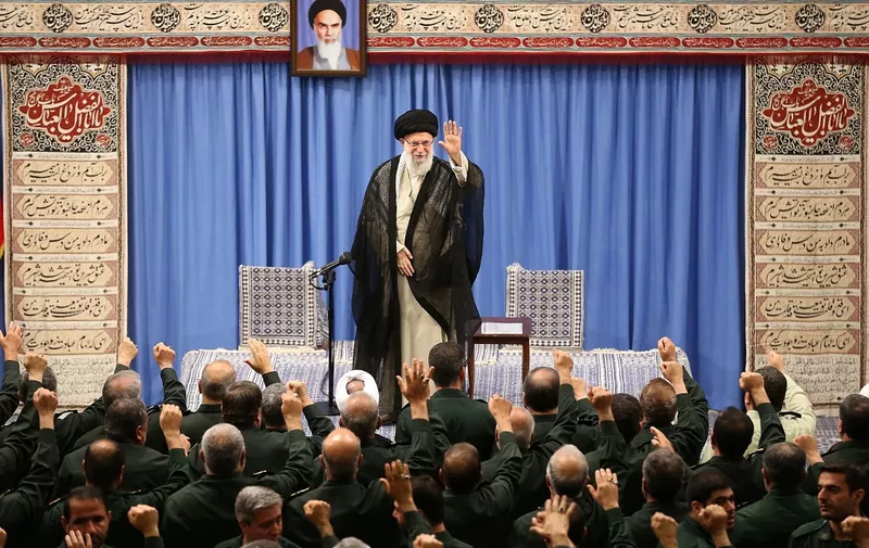 A handout picture provided by the office of Iran's Supreme Leader Ayatollah Ali Khamenei on October 2, 2019 shows him saluting members of the Islamic Revolutionary Guard Corps (IRGC) during a meeting in Tehran. (Photo by - / KHAMENEI.IR / AFP) / === RESTRICTED TO EDITORIAL USE - MANDATORY CREDIT "AFP PHOTO / HO / KHAMENEI.IR" - NO MARKETING NO ADVERTISING CAMPAIGNS - DISTRIBUTED AS A SERVICE TO CLIENTS ===
