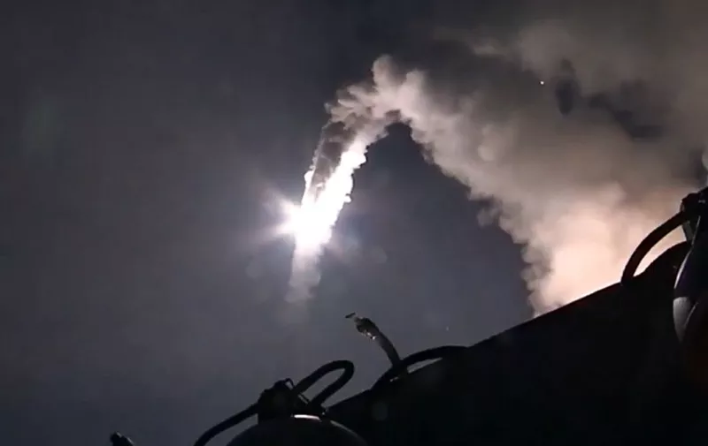 An image grab made from a video made available on the Russian Defence Ministry's official website on October 7, 2015 reportedly shows a Russian warship launching a cruise missile in the Caspian Sea during a strike against Islamic State (IS) group's positions in Syria. Russian warships joined in strikes in Syria with a volley of cruise missile attacks on October 7 as Russian President Vladimir Putin pledged his air force would back a ground offensive by government forces. AFP PHOTO / HO / RUSSIAN DEFENCE MINISTRY 
RESTRICTED TO EDITORIAL USE - MANDATORY CREDIT " AFP PHOTO / RUSSIAN DEFENCE MINISTRY" - NO MARKETING NO ADVERTISING CAMPAIGNS - DISTRIBUTED AS A SERVICE TO CLIENTS