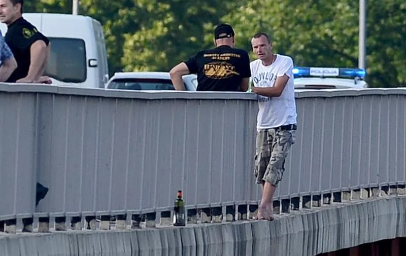 8.6.2015.,Zagreb - Policija sprijecila covjeka da se baci s mosta Mladosti u rijeku Savu. Photo: Marko Prpic/PIXSELL
