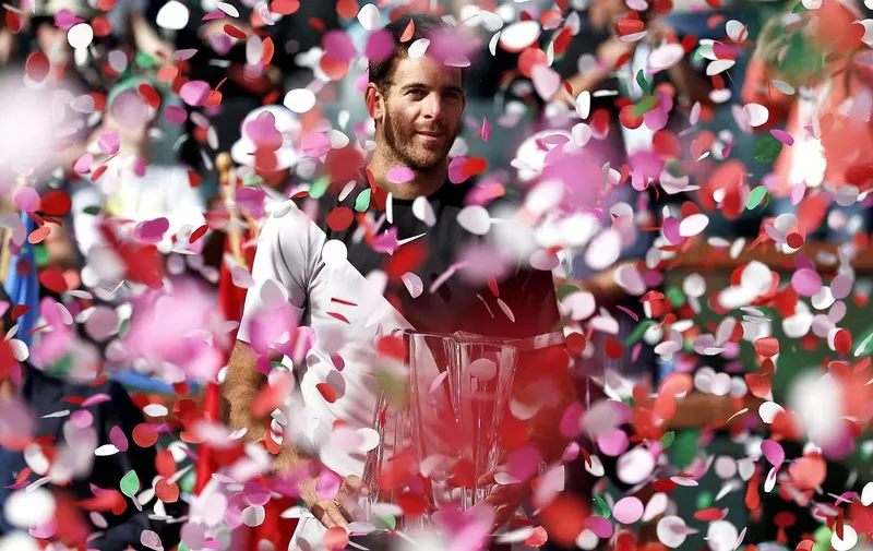 INDIAN WELLS, March 19, 2018 Juan Martin del Potro of Argentina poses during the awarding ceremony after the men singles final match against Roger Federer of Switzerland at the BNP Paribas Open tennis tournament in Indian Wells, the United States, March 18, 2018. Del Potro won 2-1 and claimed the title., Image: 366361660, License: Rights-managed, [&hellip;]