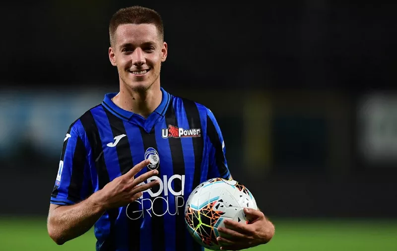 Atalanta's Croatian midfielder Mario Pasalic poses at the end of the match after scoring three goals during the Italian Serie A football match Atalanta vs Brescia played on July 14, 2020 behind closed doors at the Atleti Azzurri d'Italia stadium in Bergamo, as the country eases its lockdown aimed at curbing the spread of the COVID-19 infection, caused by the novel coronavirus. (Photo by MIGUEL MEDINA / AFP)