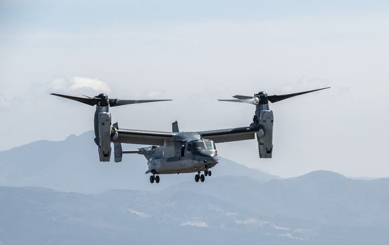 (FILES) A Japanese Self-Defense Force MV-22 Osprey tilt-rotor aircraft lands during a joint exercise with US Marine Corps personnel at the Higashifuji training area in Gotemba, Shizuoka Prefecture on March 15, 2022. A United States Osprey military aircraft crashed on a remote island north of Australia's mainland while taking part in war games on August 27, 2023, Australia's Defence Department said. (Photo by Charly TRIBALLEAU / AFP)