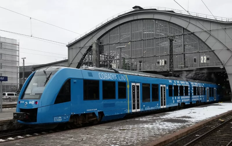 A hydrogen-powered train, by French train maker Alstom, arrives at the station of Leipzig, eastern Germany, on February 01, 2019, for its first ride on a commuting connection between Leipzig and Grimma, Saxony. (Photo by Peter Endig / dpa / AFP) / Germany OUT