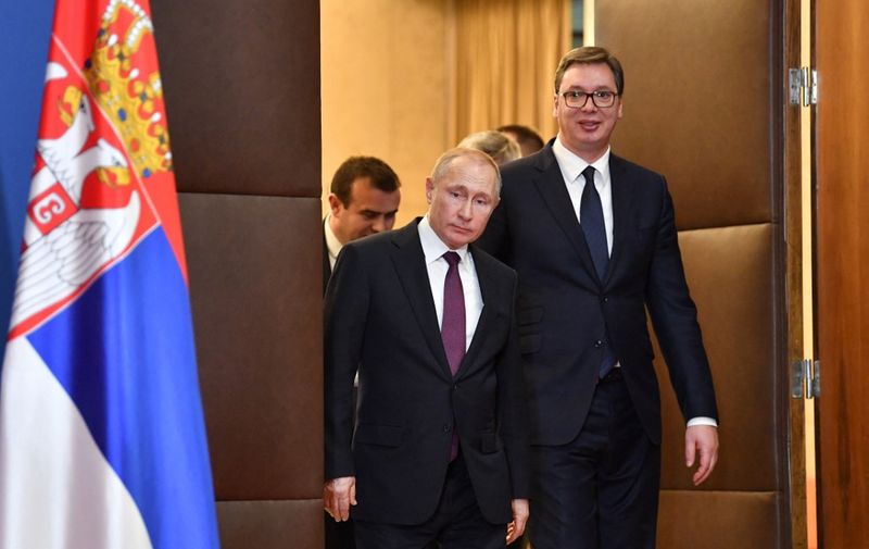 Serbian President Aleksandar Vucic and his Russian counterpart Vladimir Putin arrive to attend a signing ceremony following their talks in Belgrade on January 17, 2019. (Photo by Andrej ISAKOVIC / AFP)