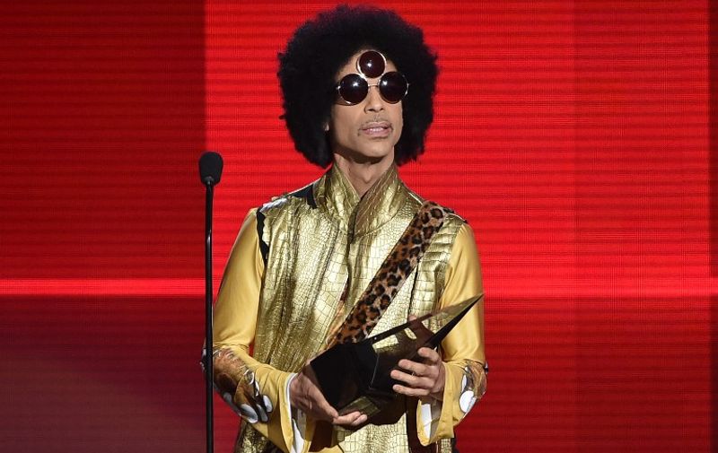 LOS ANGELES, CA - NOVEMBER 22: Musician Prince speaks onstage during the 2015 American Music Awards at Microsoft Theater on November 22, 2015 in Los Angeles, California.   Kevin Winter/Getty Images/AFP