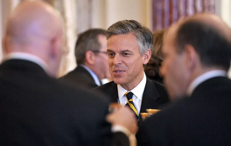 Outgoing US Ambassador to China Jon Huntsman chats with a fellow guest at the Global Chiefs of Mission Conference luncheon February 2, 2011 in the Ben Franklin Room of the State Department in Washington, DC. Huntsman resigned Monday, amid reports that he may seek the Republican nomination in 2012 and try to deprive his boss, President Barack Obama, of a second term. AFP PHOTO/Mandel NGAN / AFP PHOTO / MANDEL NGAN