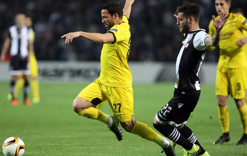 Dortmund's Gonzalo Castro (L) and Paok's Dimitris Konstantinidis vie for the ball during the UEFA Europa League group C football match between PAOK FC and Borussia Dortmund at the Stadio Toumba in Thessaloniki on October 1, 2015. 