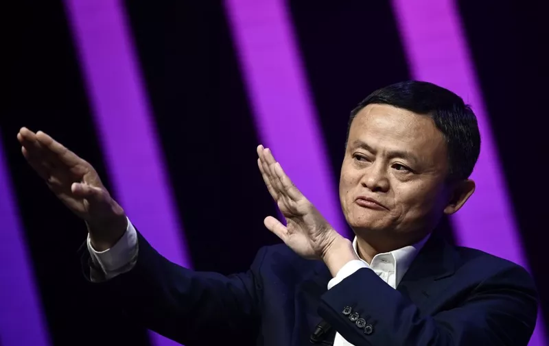 Jack Ma, CEO of Chinese e-commerce giant Alibaba, gestures as he speaks during his visit at the Vivatech startups and innovation fair, in Paris on May 16, 2019. (Photo by Philippe LOPEZ / AFP)