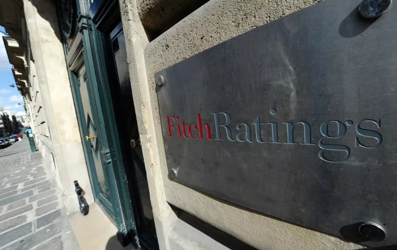 A picture shows the entrance of Fitch ratings agency on August 8, 2011 in Paris. Frankfurt and Paris stocks fell by more than 4 percent in afternoon trading on August 8, 2011, following the opening on Wall Street after last week's historic downgrade of the United States' credit rating, which compounded concerns over the world's biggest economy as well as the global outlook. AFP PHOTO MIGUEL MEDINA / AFP PHOTO / MIGUEL MEDINA