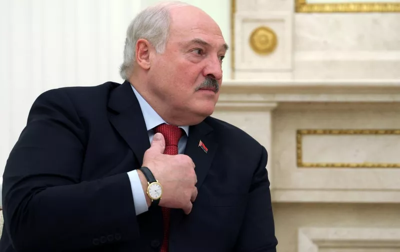 In this pool photograph distributed by the Russian state agency Sputnik, Belarusian President Alexander Lukashenko attends a meeting with Russian President in Moscow on April 11, 2024. (Photo by Gavriil GRIGOROV / POOL / AFP)