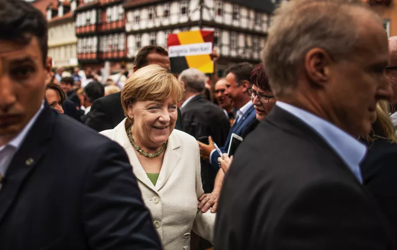 August 26, 2017 - Quedlinburg, Saxony-Anhalt, Germany: Under loud protests of right wing demonstrators the German Chancellor and Christian Democrat (CDU) Angela Merkel arrives for her speech at an election campaign stop in Quedlinburg, Germany. Merkel is seeking a fourth term in federal elections scheduled for September 24 and she currently holds a double-digit lead over her main rival, German Social Democrat Martin Schulz., Image: 348706451, License: Rights-managed, Restrictions: No publication in Germany, Switzerland and Austria media before December 4, 2017, Model Release: no, Credit line: Profimedia, Polaris
