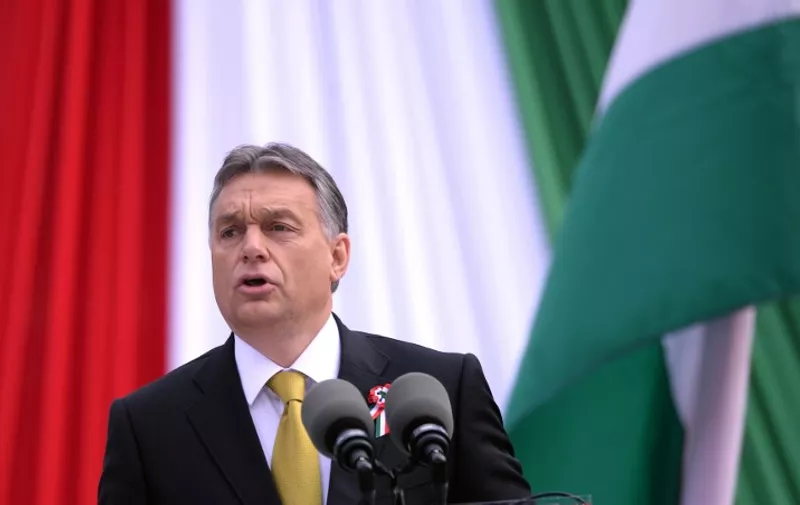 FILES - Hungarian Prime Minister Viktor Orban delivers his speech in front of the National Museum of Budapest on March 15, 2015 during the official commemoration of the 167th anniversary of the 1848-1849 Hungarian revolution and independence war. Hungarian Prime Minster Viktor Orban raised again on May 8, 2015 the thorny topic of the death penalty in the European Union, saying member states should be able to decide on the issue themselves. AFP PHOTO / ATTILA KISBENEDEK