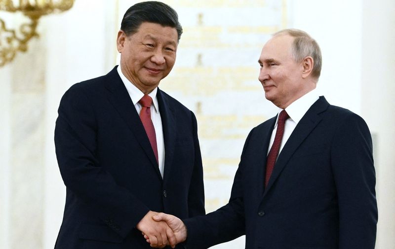 Russian President Vladimir Putin meets with China's President Xi Jinping at the Kremlin in Moscow on March 21, 2023. (Photo by Alexey MAISHEV / SPUTNIK / AFP)