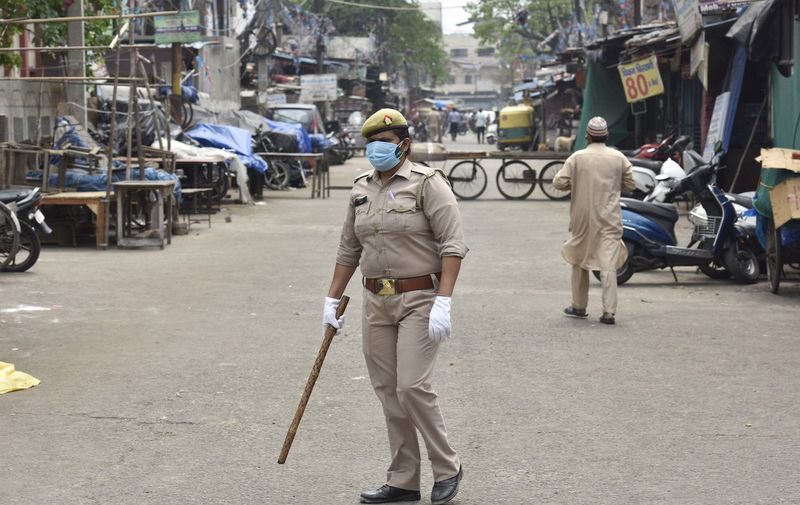 Police personnel screening commuters at sector 8 road during curfew imposed to curb the spread of coronavirus disease (Covid-19) on May 7, 2021 in Noida, India.
Lockdown In Noida Amid Covid Pandemic, Uttar Pradesh, India - 07 May 2021,Image: 609850807, License: Rights-managed, Restrictions: , Model Release: no, Credit line: Profimedia
