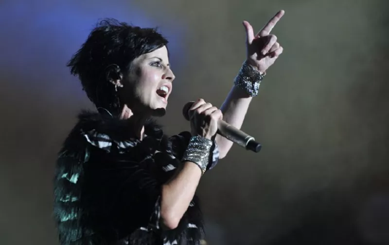 (FILES) This file photo taken on July 07, 2016 shows Irish singer Dolores O'Riordan of the Irish band The Cranberries performing on stage during the 23th edition of the Cognac Blues Passion festival in Cognac on July 7, 2016. 
The Cranberries singer Dolores O'Riordan died on January 15, 2018 in London at the age of 46, a publicist statement said.  / AFP PHOTO / GUILLAUME SOUVANT