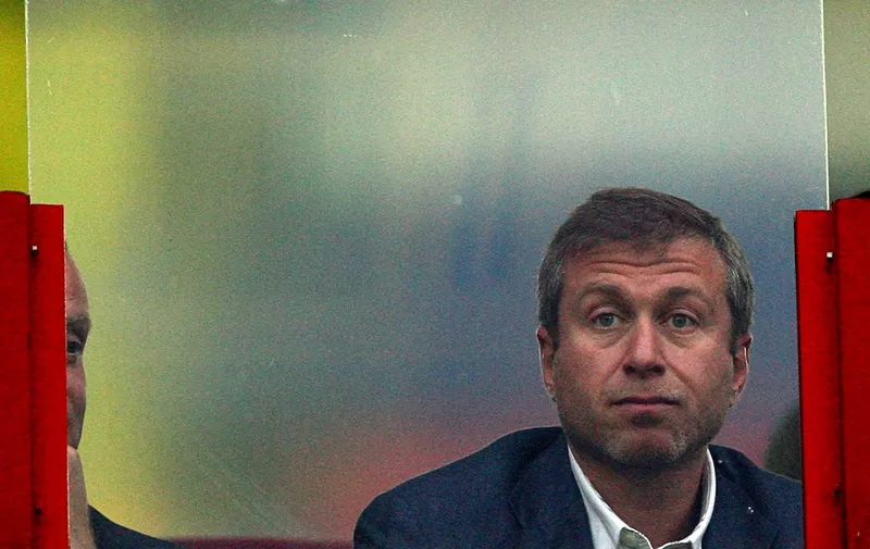 Russian billionare and Chelsea football team owner Roman Abramovich takes a seat in a VIP lounge prior to the game with Lokomotiv in the semi-final of the pre-season's Russian Railways Cup tournament in Moscow on August 1, 2008. Russian Lokomotiv, British Chelsea, Spanish Sevilla and Italy's giants AC Milan are taking part in the tournament.   AFP PHOTO / ALEXANDER NEMENOV (Photo by ALEXANDER NEMENOV / AFP)