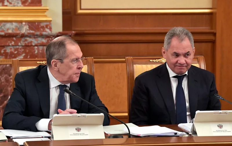 Russian Foreign Minister Sergei Lavrov and Defence Minister Sergei Shoigu attend a government meeting in Moscow on March 26, 2020. (Photo by Alexander ASTAFYEV / SPUTNIK / AFP)