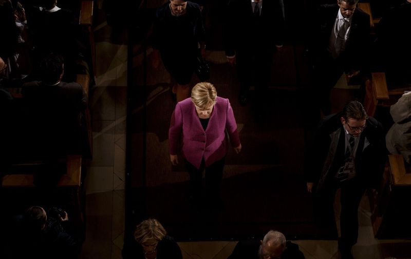 BERLIN, GERMANY - OCTOBER 03: Federal Chancellor and Chairman of the CDU Angela Merkel leaves after the end a service at the Dom cathedral during celebrations to mark German Unity Day on October 3, 2018 in Berlin, Germany. Unity Day, a national holiday, marks the reunification of Germany in 1990 from Cold War-era West Germany and East Germany. (Photo by Carsten Koall/Getty Images), Image: 389593733, License: Rights-managed, Restrictions: Pool Photo, Model Release: no, Credit line: Profimedia, DDP