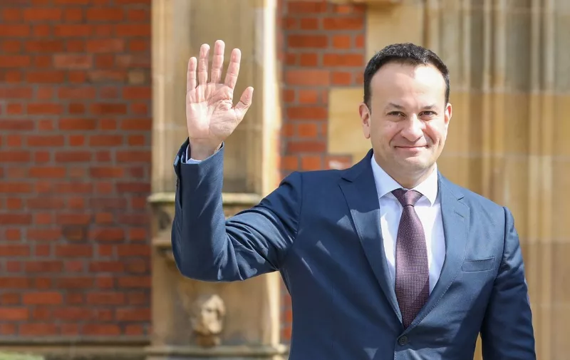 (FILES) Ireland's Prime Minister Leo Varadkar waves as he arrives for the final day of a conference to mark the 25th anniversary of the Good Friday Agreement, at Queen's University in Belfast on April 19, 2023. Leo Varadkar announced on March 20, 2024 that he was stepping down as Ireland's prime minister and leader of the Fine Gael party in the governing coalition for personal and political reasons. "I am resigning the presidency and leadership of Fine Gael and will resign as Taoiseach as soon as my successor is able to take up that office," an emotional Varadkar told reporters in Dublin. (Photo by PAUL FAITH / AFP)