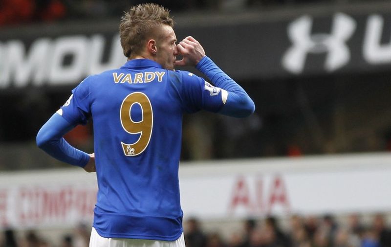 Leicester City's English striker Jamie Vardy celebrates scoring his goal during the English Premier League football match between Tottenham Hotspur and Leicester City at White Hart Lane in London on March 21, 2015. AFP PHOTO / IAN KINGTON

RESTRICTED TO EDITORIAL USE. NO USE WITH UNAUTHORIZED AUDIO, VIDEO, DATA, FIXTURE LISTS, CLUB/LEAGUE LOGOS OR LIVE SERVICES. ONLINE IN-MATCH USE LIMITED TO 45 IMAGES, NO VIDEO EMULATION. NO USE IN BETTING, GAMES OR SINGLE CLUB/LEAGUE/PLAYER PUBLICATIONS. / AFP / IAN KINGTON